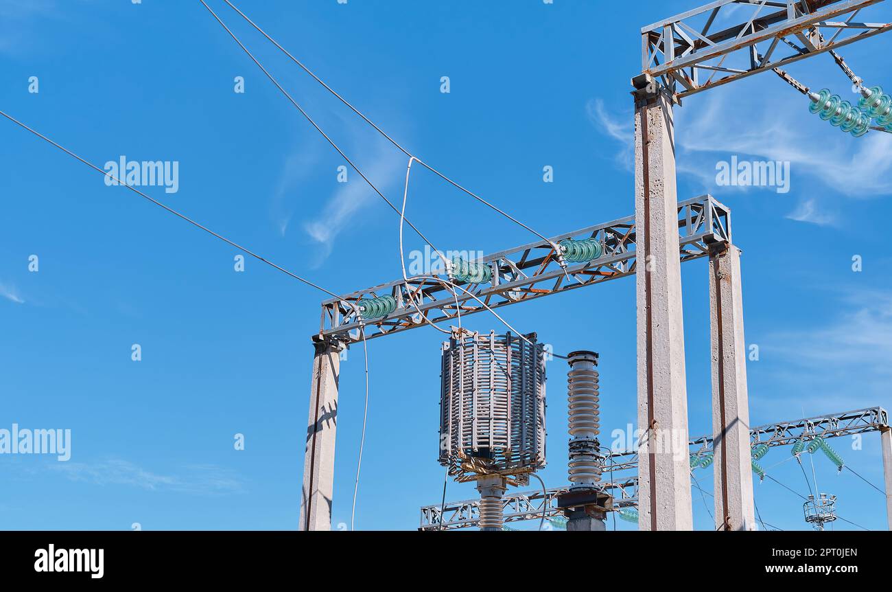 Power lines and switchgear and high voltage equipment in front of the