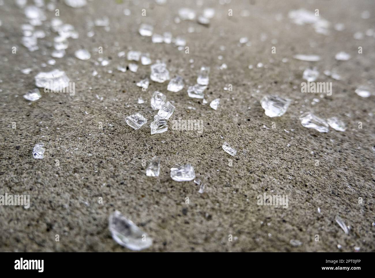 Detail of broken glass in the garbage, danger due to cuts Stock Photo