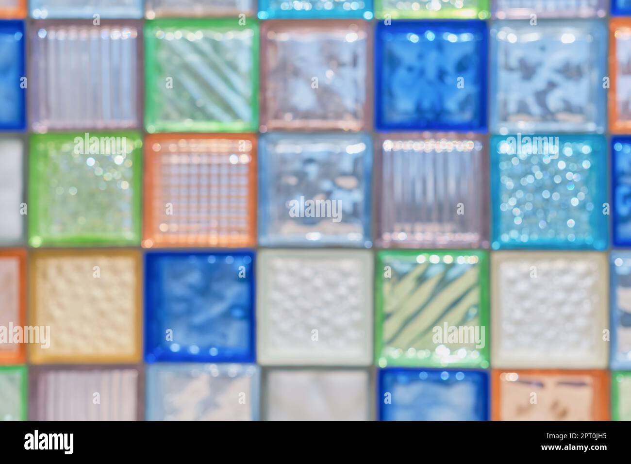 Blurred background from glass colorful square blocks. Screensavers or wallpaper for advertising. Abstract background, construction of glass walls or p Stock Photo