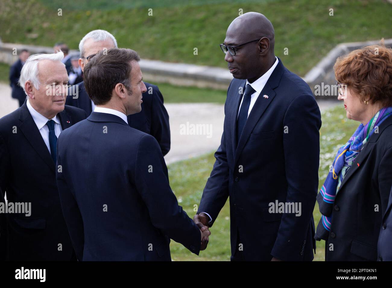 French President Emmanuel Macron shakes hand with Haitian Ambassador to  France Jean Josue Pierre Dahomey next to former prime minister Jean-Marc  Ayrault visits the Chateau de Joux during a ceremony marking the