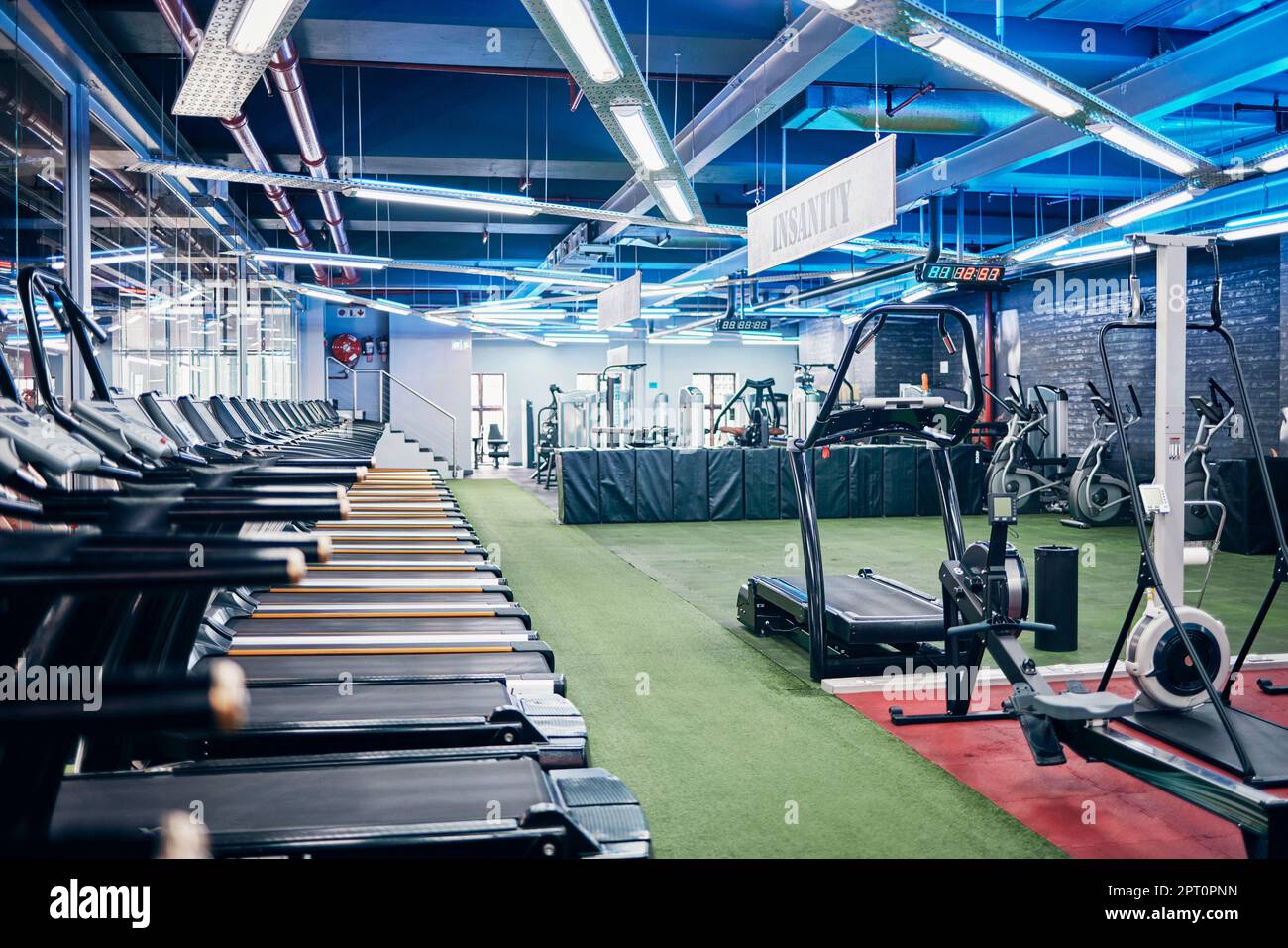 Empty gym equipment and studio for fitness exercise and sports