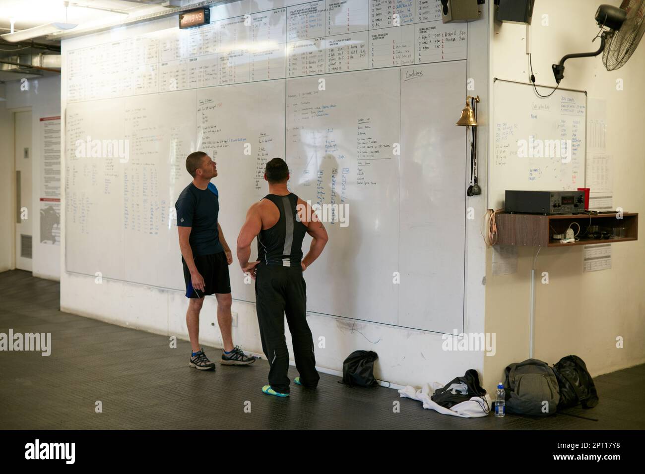 Setting their goals. Full length shot of two young men looking at a