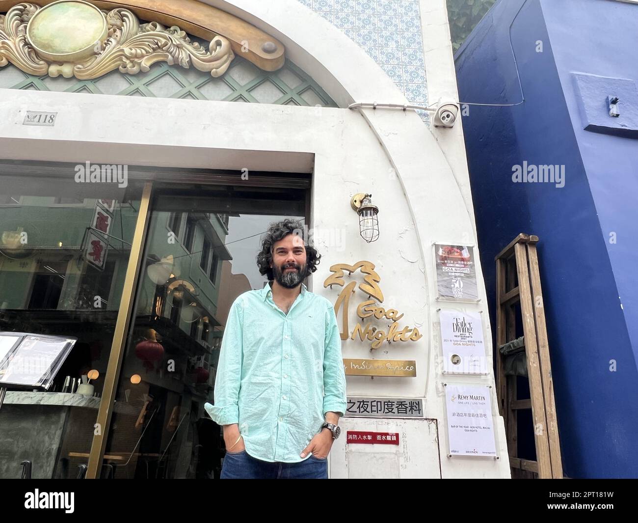 Goa Nights owner Gagan Sethi stands in front of his restaurant in Taipa Village in Macau on April 9, 2023. 09APR23 SCMP/ Ralph Jennings Stock Photo