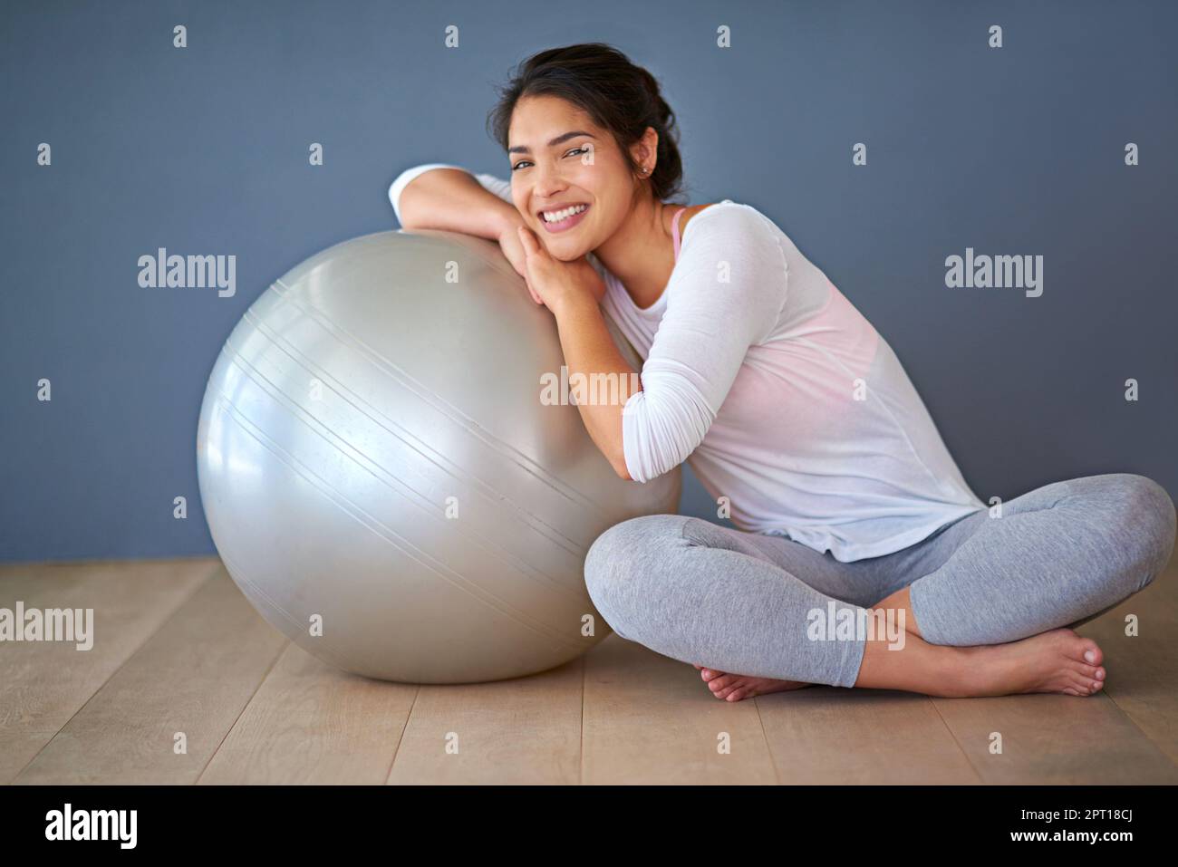 This is a must-have for every home gym. a sporty young woman