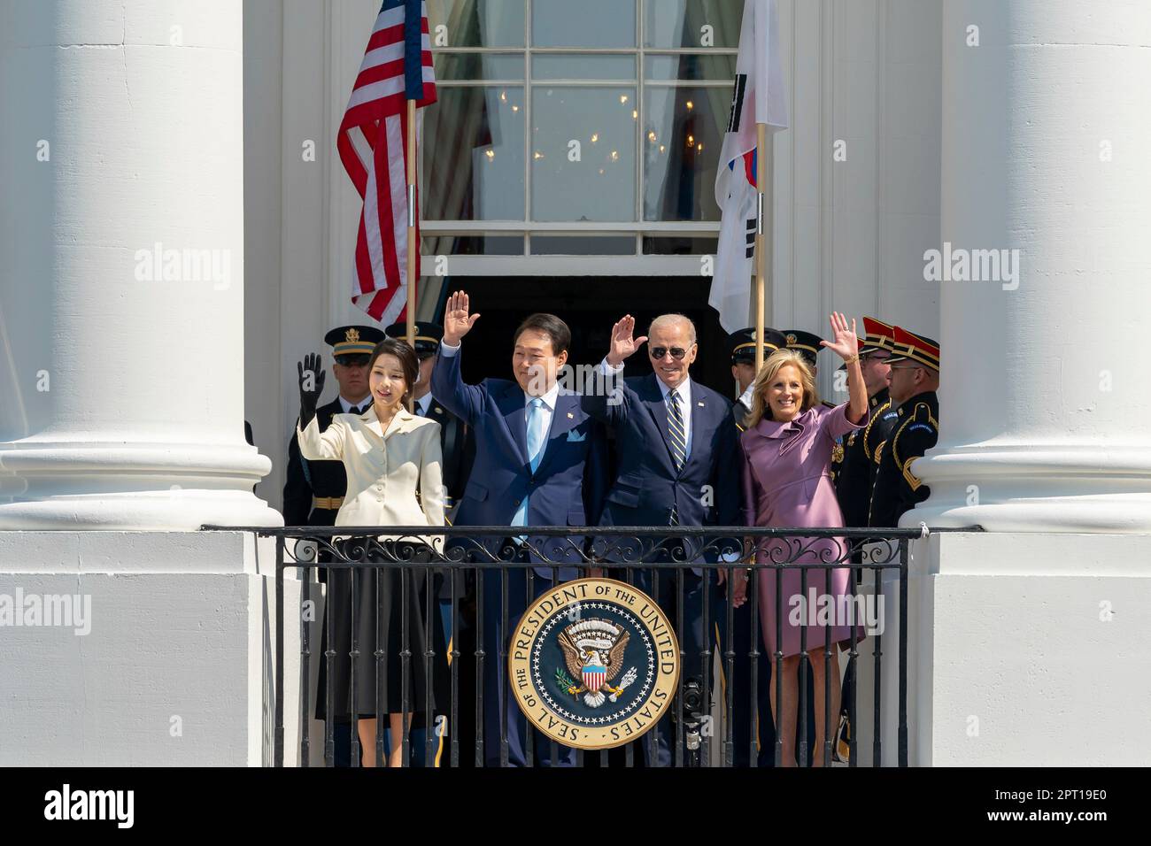 Washington, United States Of America. 26th Apr, 2023. Washington, United States of America. 26 April, 2023. U.S President Joe Biden and South Korean President Yoon Suk-yeol wave during the State Arrival Ceremony from the Blue Room balcony at the White House April 26, 2023 in Washington, DC Standing from left are: South Korean First Lady Kim Keon Hee, South Korean President Yoon Suk Yeol, U.S. President Joe Biden and first lady Jill Biden. Credit: Adam Schultz/White House Photo/Alamy Live News Stock Photo