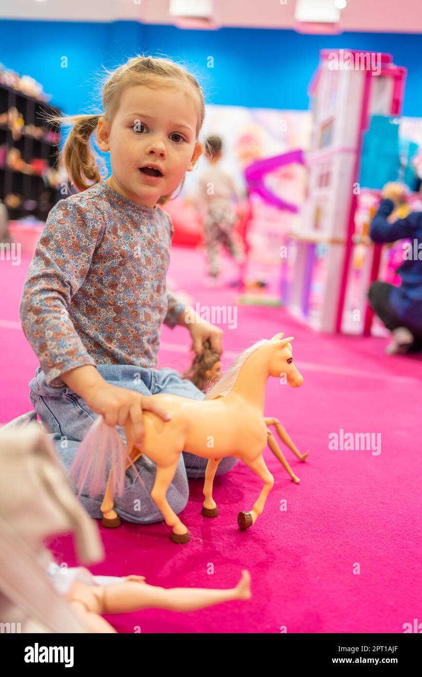 Prague, Czech Republic April 27, 2023 Little girl playing in