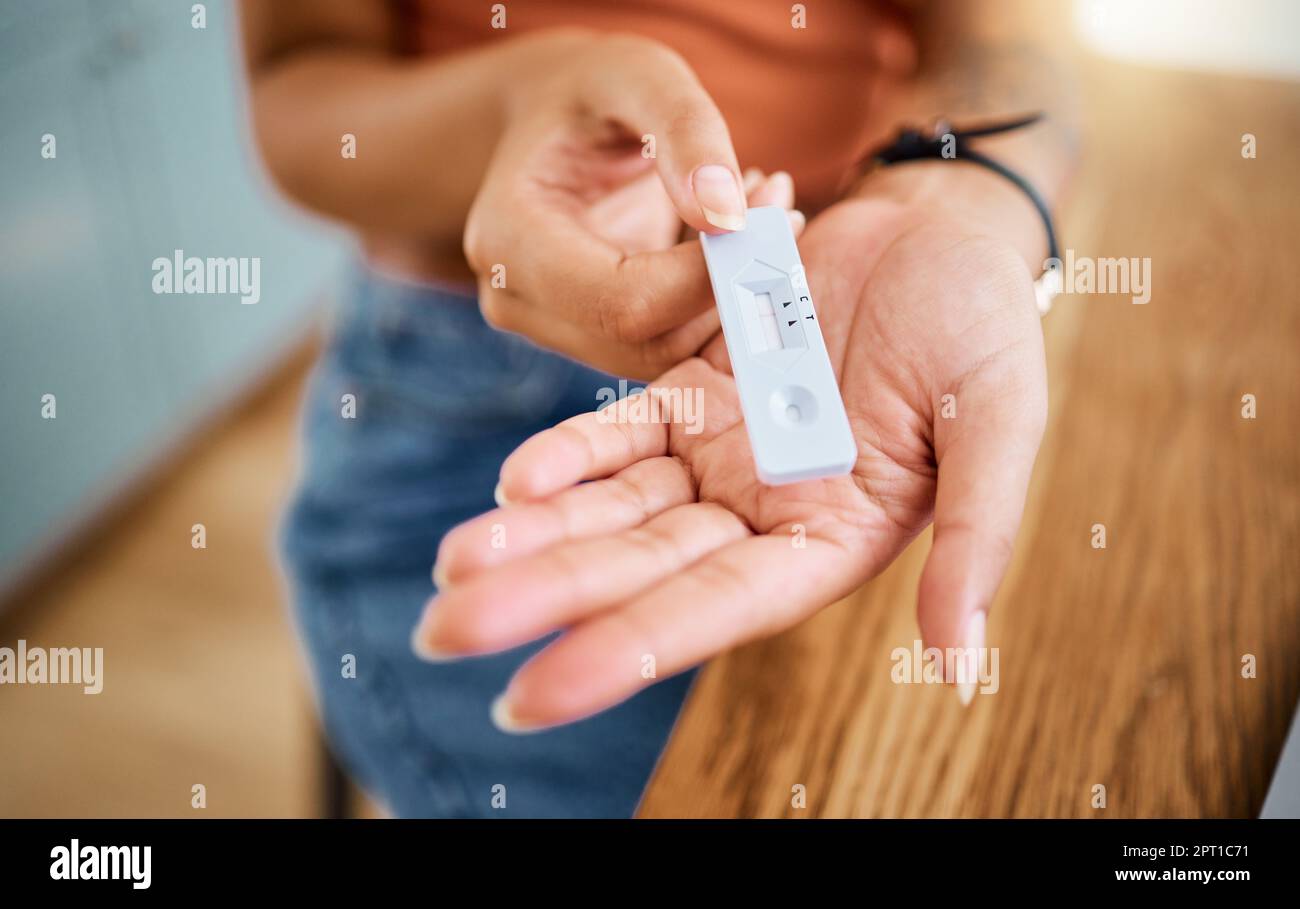 Woman hands holding a covid test for safety, healthcare and medicare