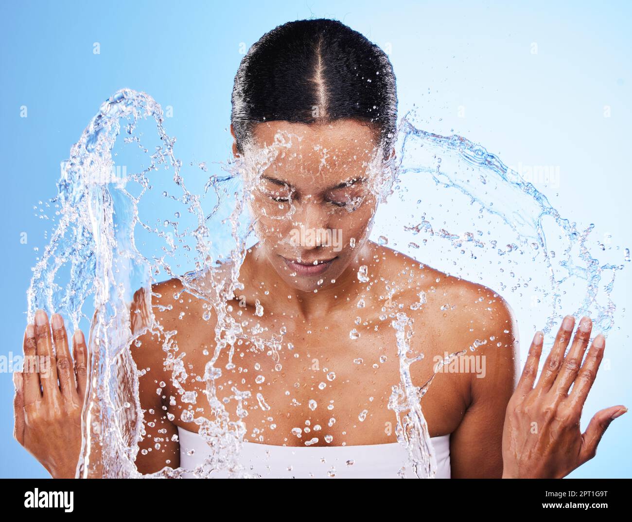 Water splash, cleaning and woman with water, facial clean and skincare hygiene, wellness and