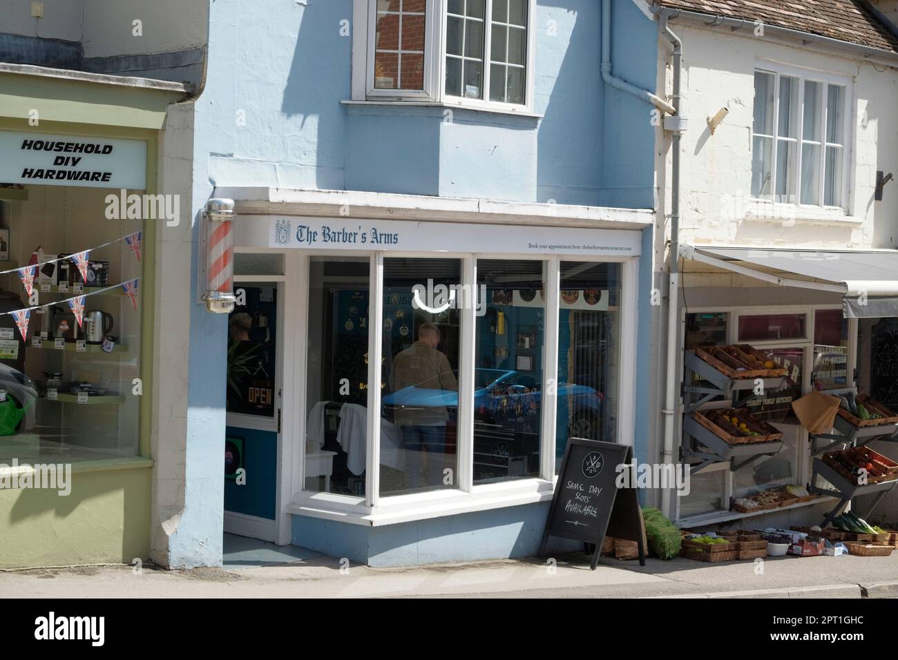 Tisbury a small Wiltshire village. The Barbers Arms, the village barber Stock Photo Alamy
