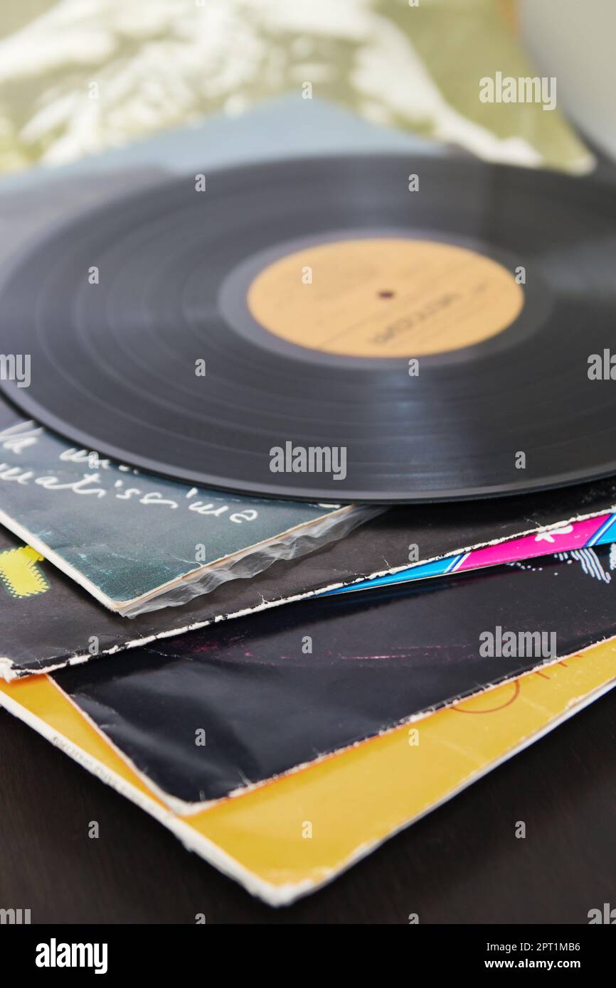 Vinyl recording disk and different albums with plates Stock Photo Alamy