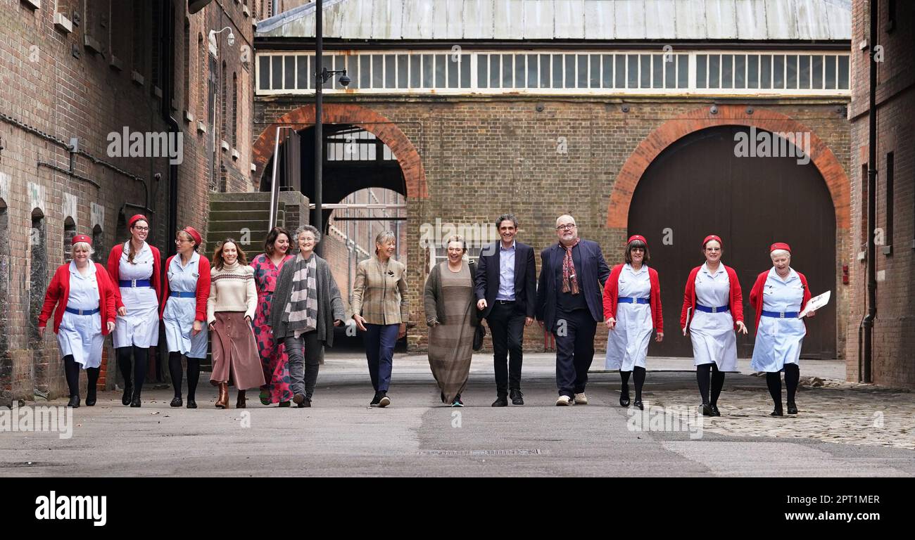 Cast members, Laura Main (fourth from left) Rebecca Gethings, Georgie Glen, Jenny Agutter, Annabelle Apsion, Stephen McGann and Cliff Parisi (fourth from right) walk with tour guides through parts of the set during a visit to the Call The Midwife Official Location Tour at the Historic Dockyard Chatham in Kent. Picture date: Thursday April 27, 2023. Stock Photo