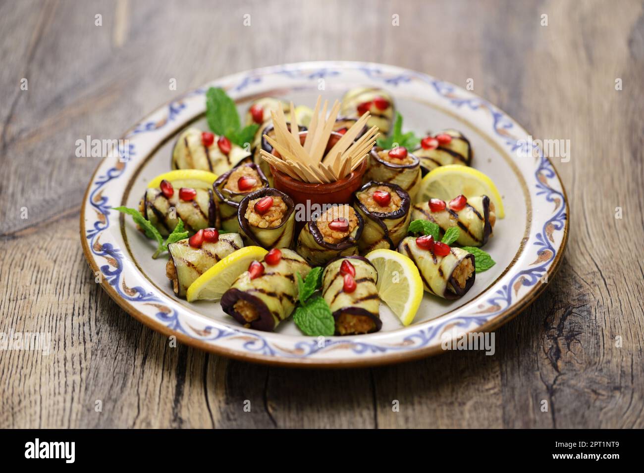 Georgian eggplant rolls with walnut paste filling, badrijani nigvzit Stock Photo