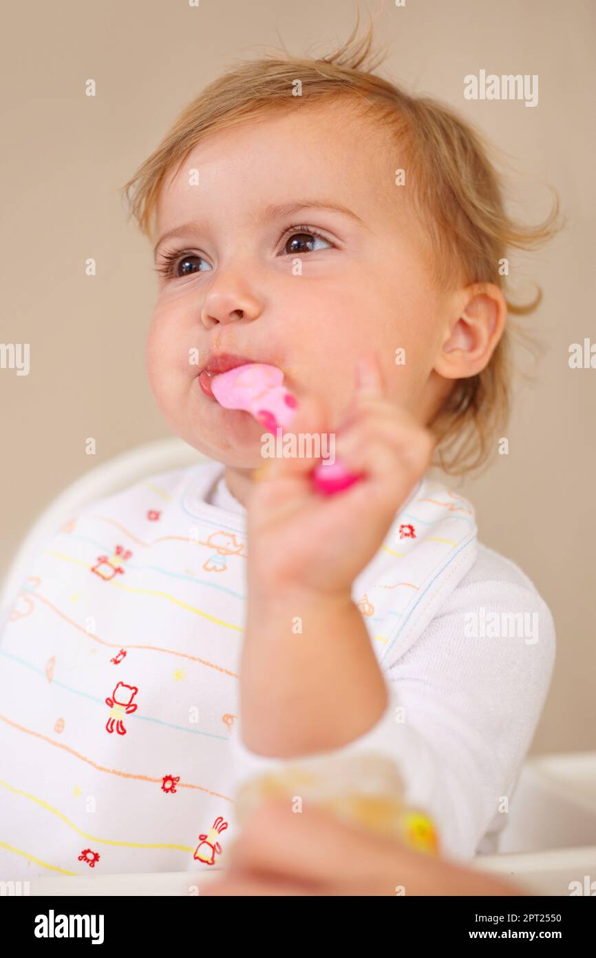 Cute and adorable are the only words for him. a baby boy at home Stock