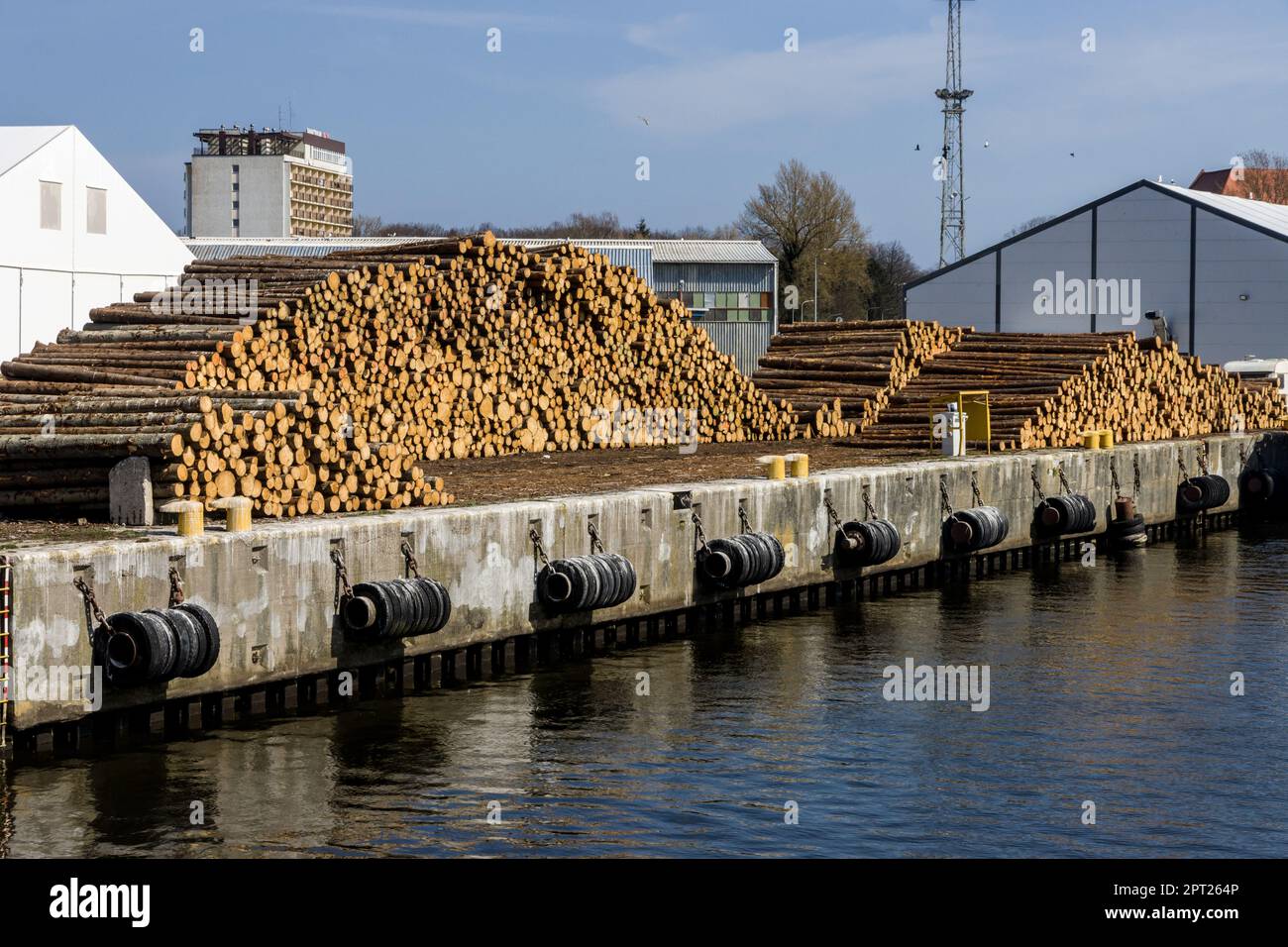 A stack of wood in a port Stock Photo