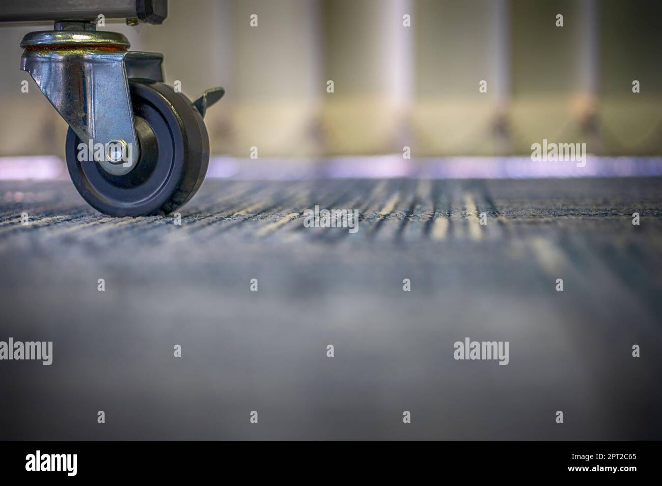 Small black rubber wheels on the carpet Stock Photo Alamy