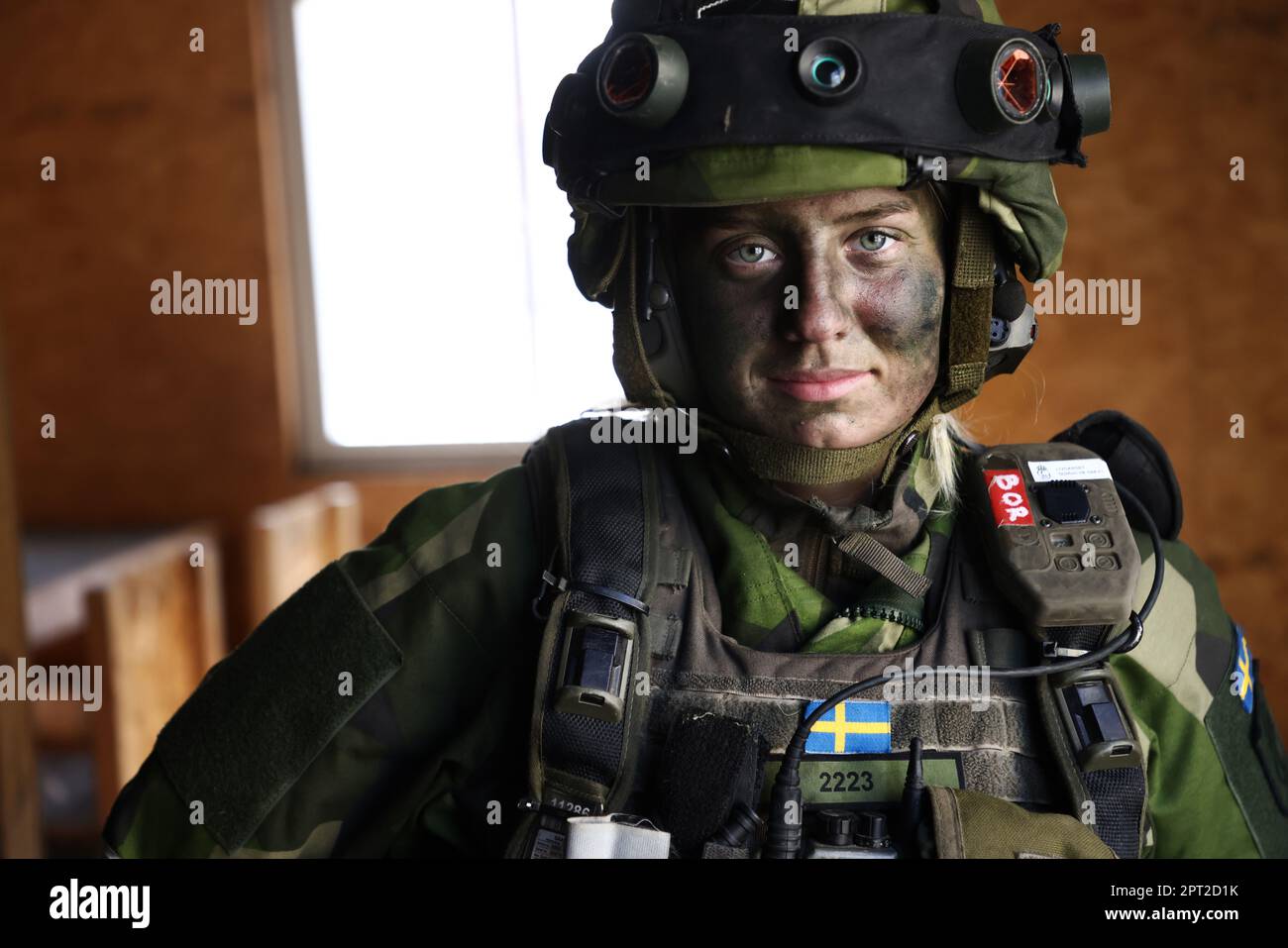 Swedish female soldier at STA MOUT, which is a combat training facility  consisting of an urban environment, during the large military exercise  Aurora23, at the Land Warfare Centre (In Swedish: Markstridsskolan, MSS),