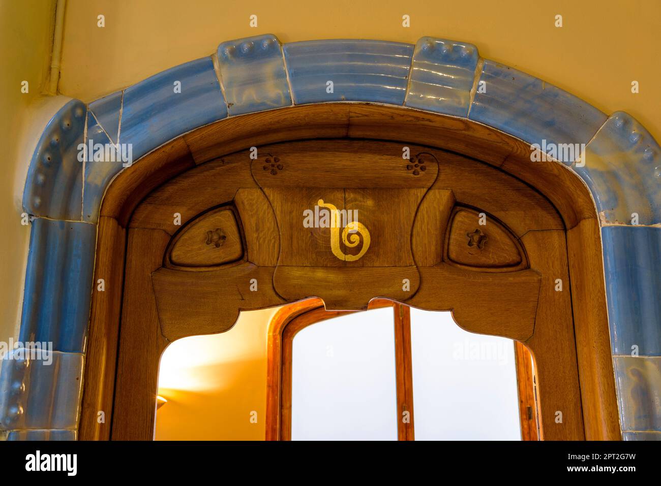 Detail of the numbering with a letter on the access door to an apartment in Casa Batlló (Barcelona, Catalonia, Spain) Stock Photo