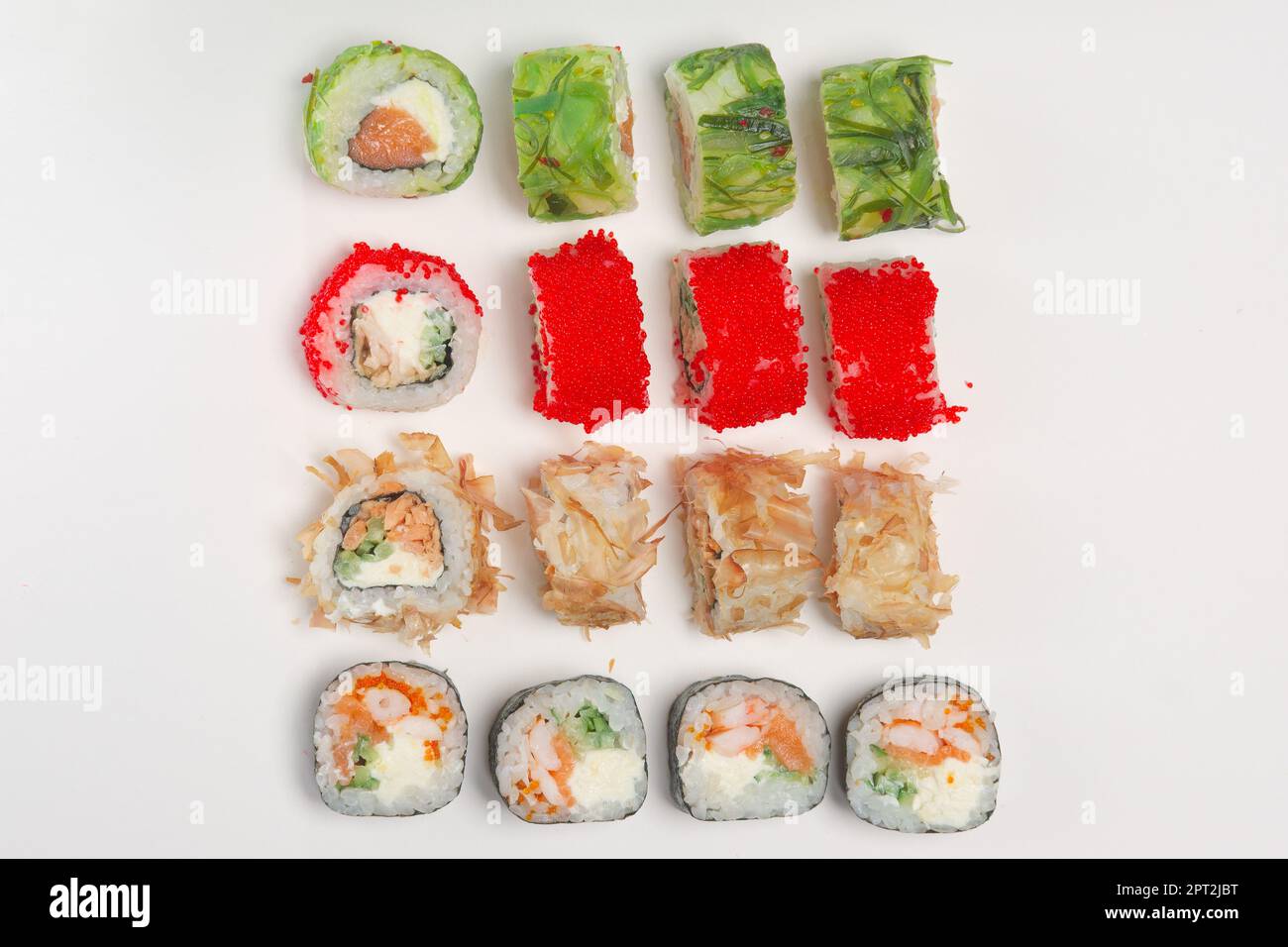 Set of rolls with smoked salmon, eel, chuka salad and flying fish roe ...