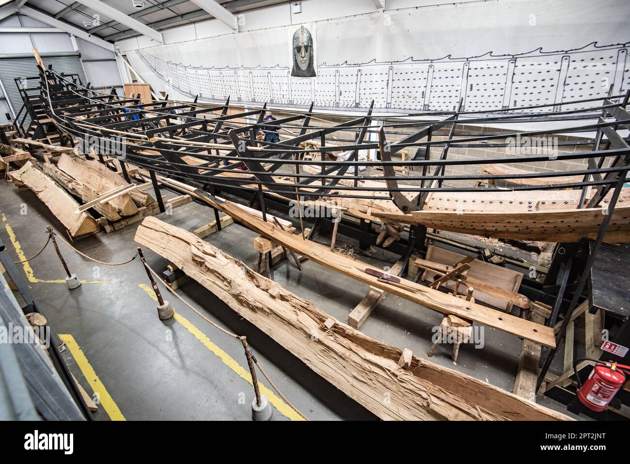 Wedges being used during cleaving, along the longitudinal. grain to