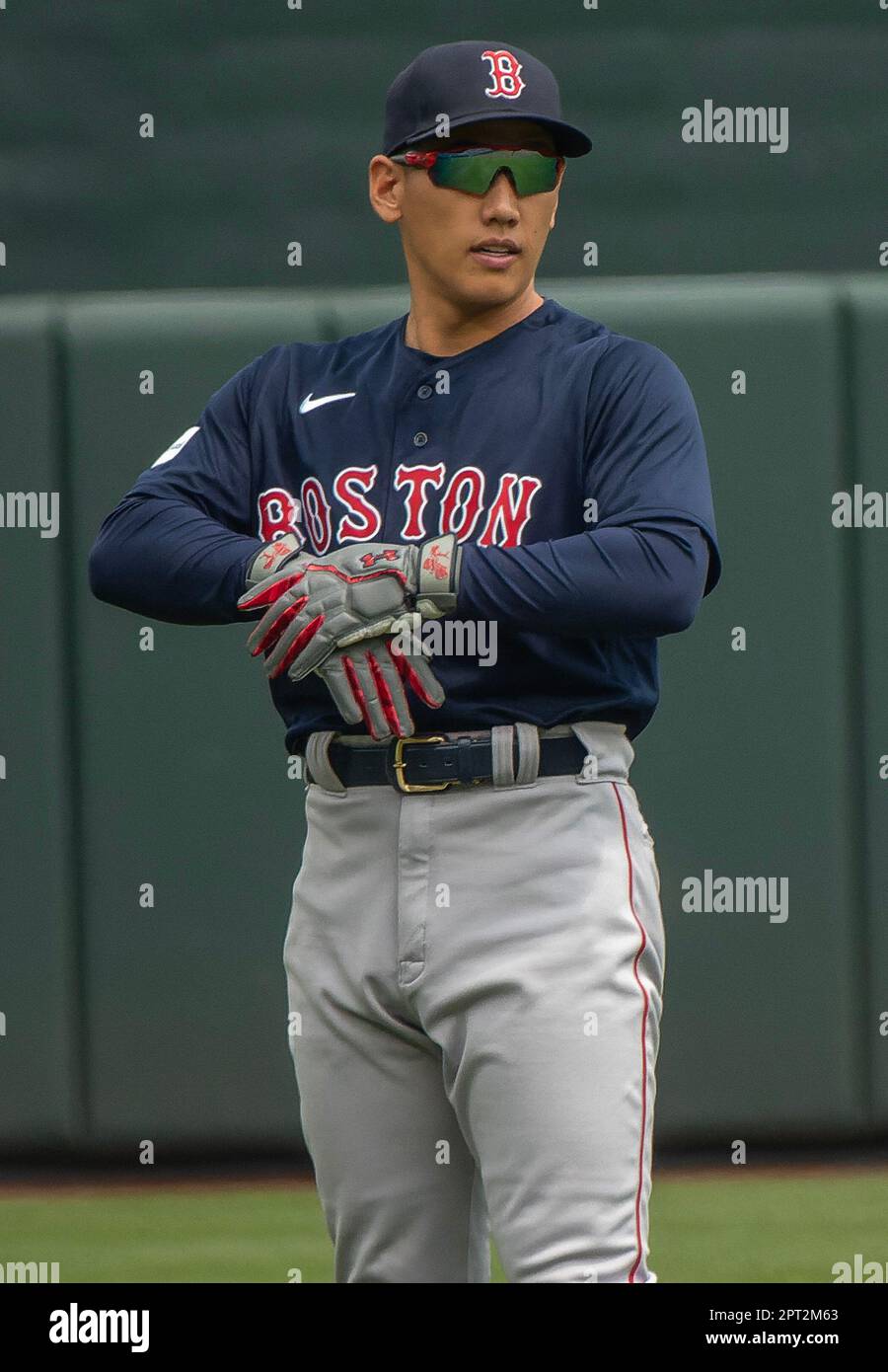 Boston Red Sox left fielder Masataka Yoshida (7)  warms up before a game Stock Photo
