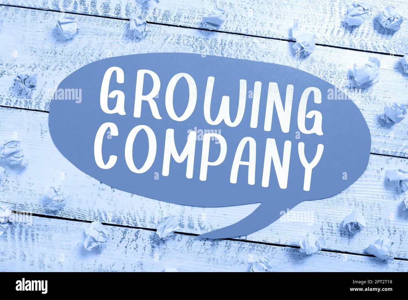 Conceptual caption Growing Company, Word for a business firm that is still undergoing a development Speech Bubble With Important Information Placed In Stock Photo