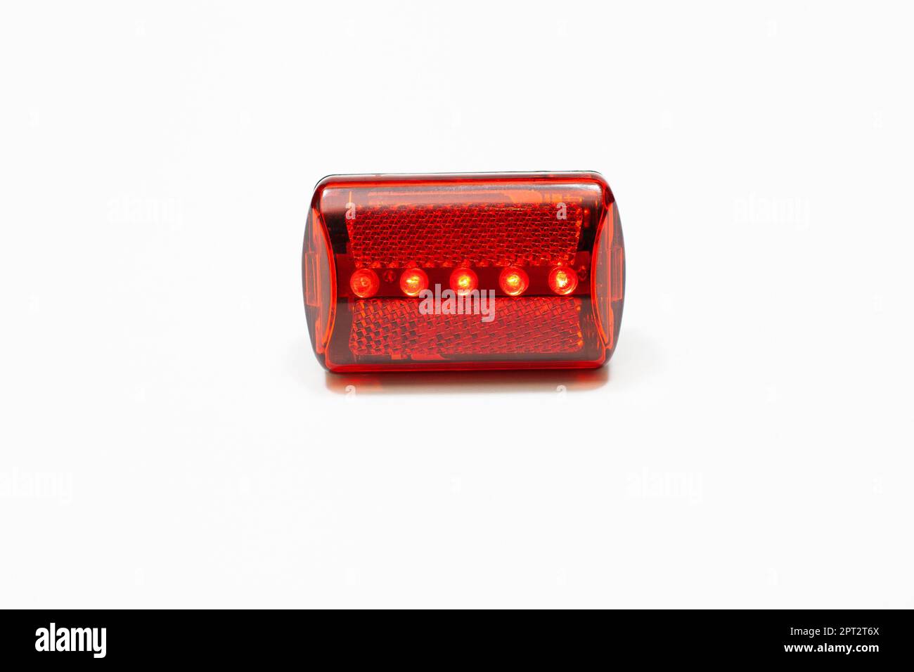 Red bicycle taillight isolated on white background Stock Photo