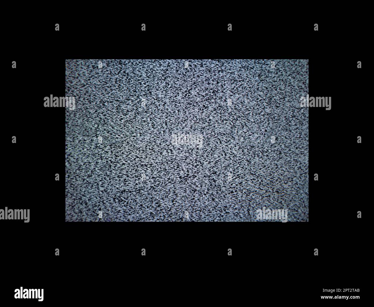 Television noise, interference on a black background Stock Photo