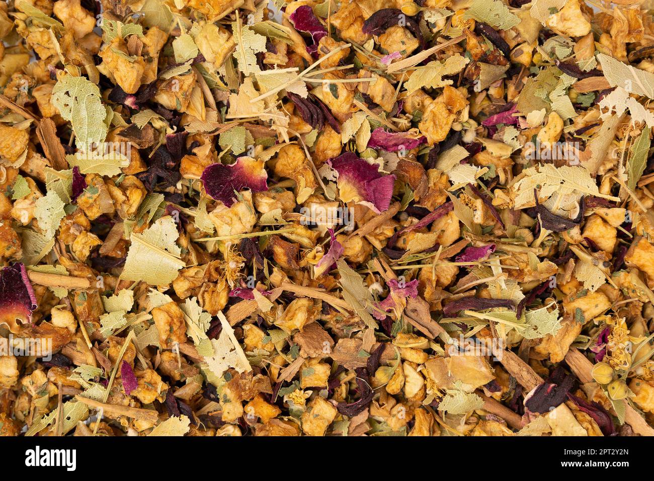 Tea leaves steeped in a vintage ceramic teapot, creating a soothing