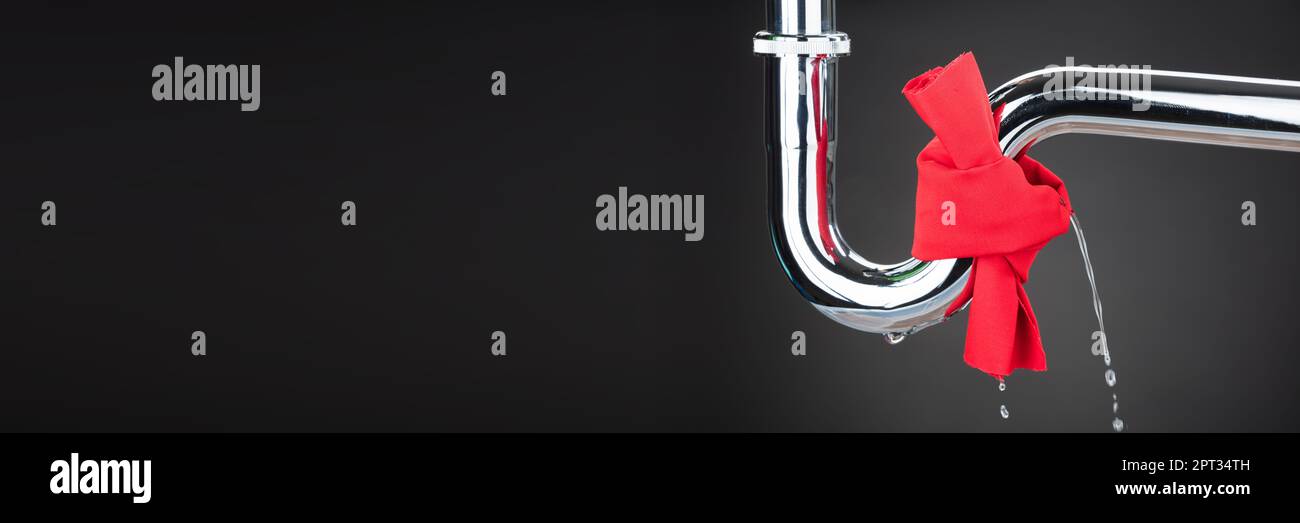 Broken Pipe Leak Fix And Water Leakage Stock Photo Alamy