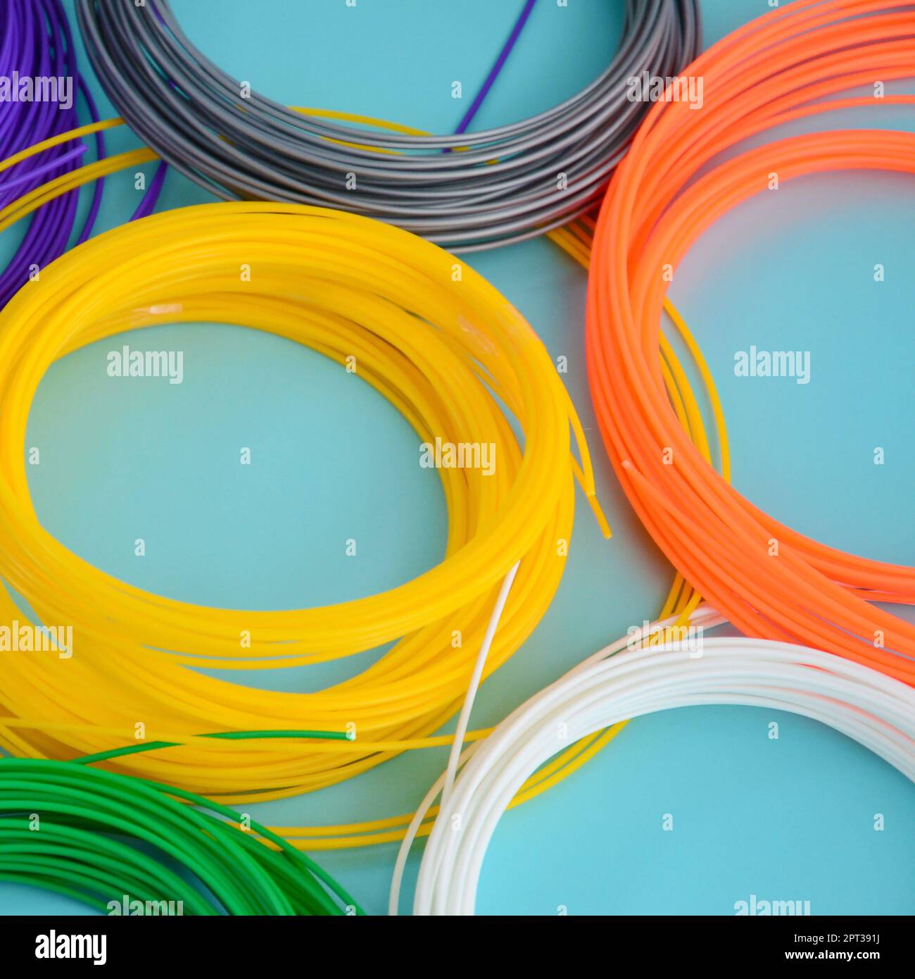 3D printing pen filaments of various colors. Plastic PLA and ABS