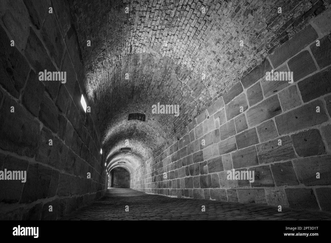 tunnel under a historic castle Stock Photo