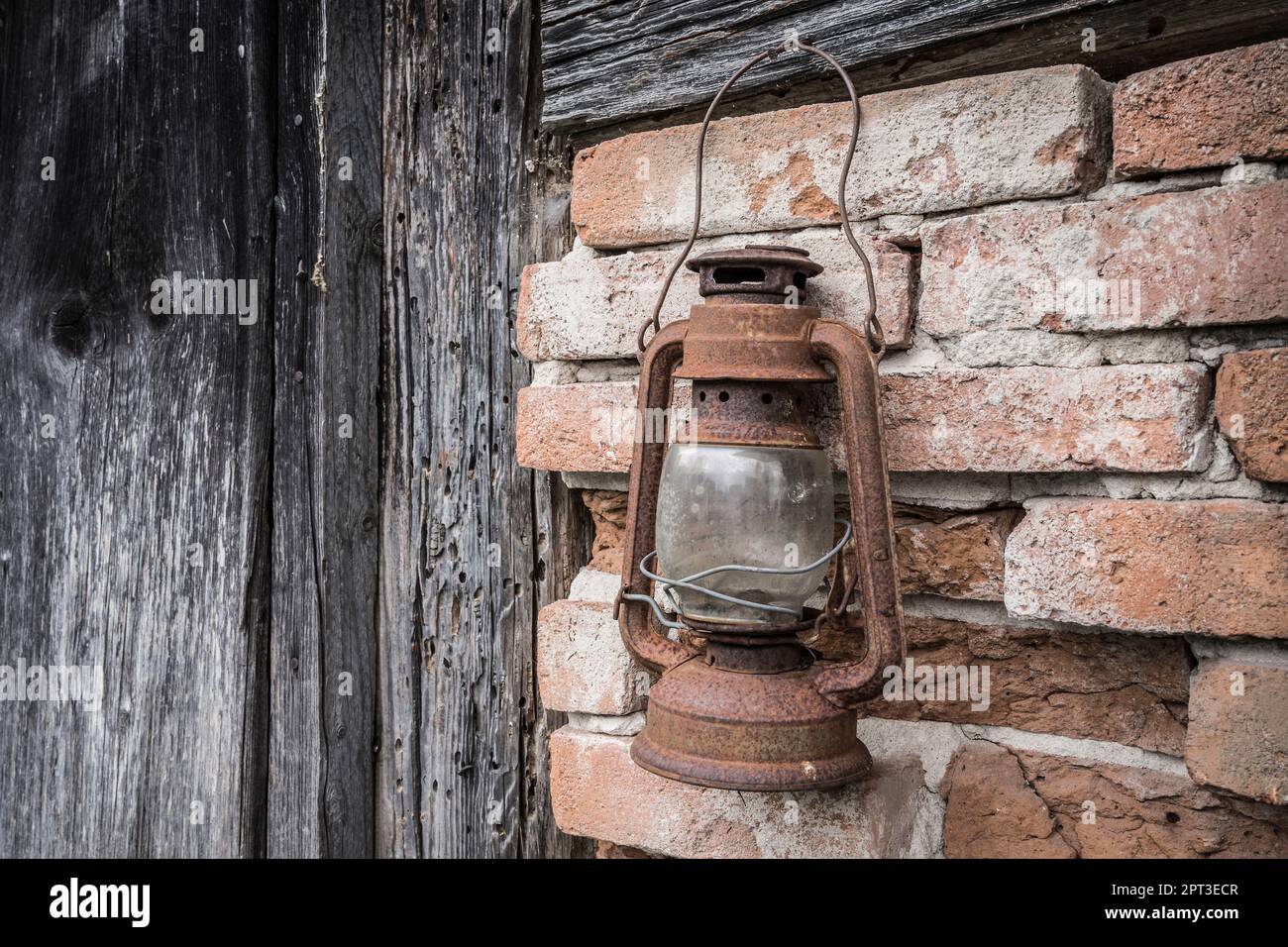 rusty lantern in a abandoned house Stock Photo