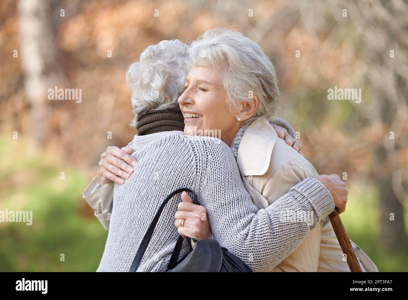 Two senior women hugging hi-res stock photography and images - Alamy