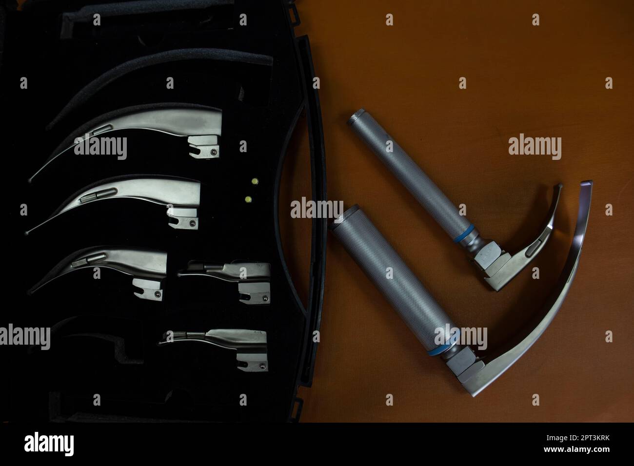 A laryngoscope is an instrument used to examine the larynx Stock Photo Alamy