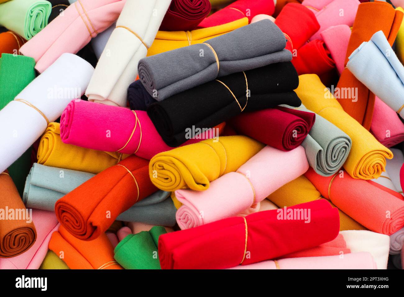 Detailed close up view on samples of cloth and fabrics in different ...