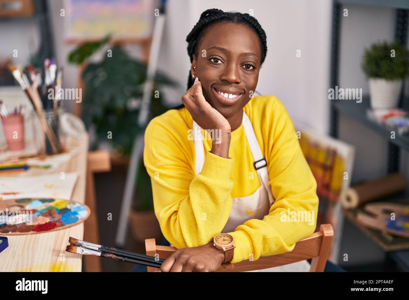 African american woman artist smiling confident at art studio Stock ...