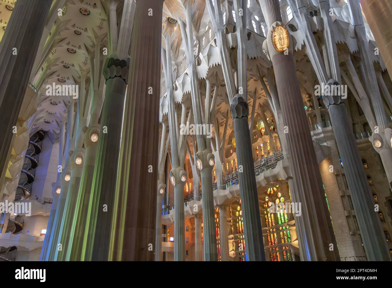 BARCELONA, SPAIN-AUGUST 22, 2022: Columns and stained glass windows ...