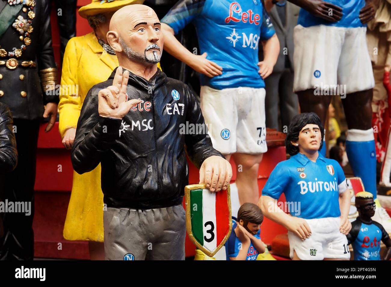 Napoli, Italy. 27th Apr, 2023. Statuette depicting the Napoli coach Luciano Spalletti, during the preparations for the celebration of the victory of the Italian Serie A championship and the third scudetto 'shield with the colors of the Italian flag, which is worn on the game uniform by the team that won the championship in the previous season'. Credit: Vincenzo Izzo/Alamy Live News Stock Photo