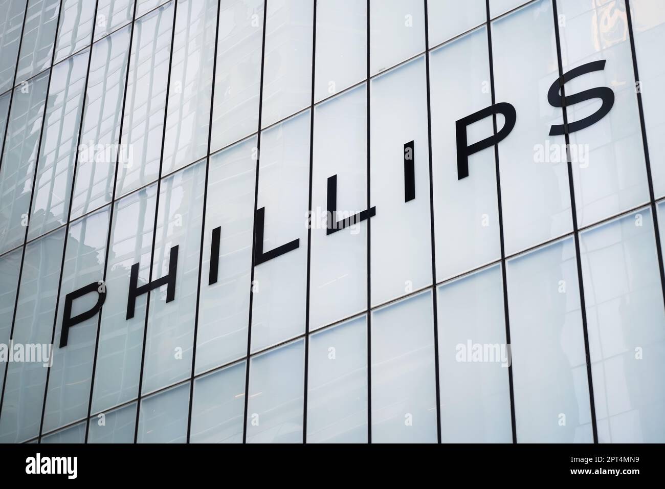 New York, NY - April 26, 2023 : Russian luxury goods company Mercury Group owned Phillips Auction House sign locate on Park Ave in Manhattan. Stock Photo
