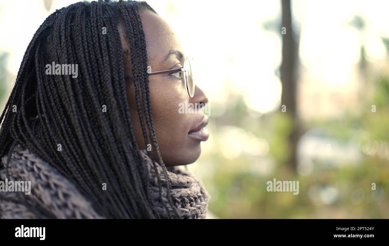 Relaxed african woman wearing green hi-res stock photography and images ...