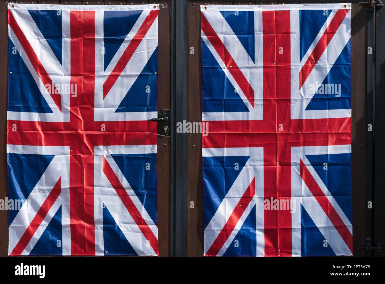 Royal Celebrations, double Union Jacks, flying the flag, Union Flag, flagpole, United Kingdom, flag, ensign, national flags, fly national flags, flag. Stock Photo