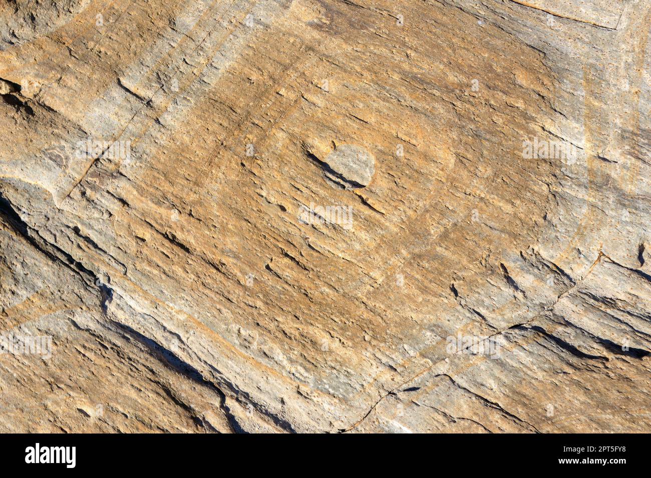 unusual rock formations of the volcanic cliff on Cala Sapone beach ...