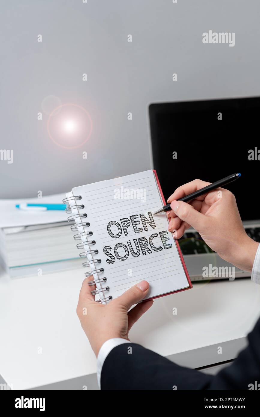 Text caption presenting Open Source, Conceptual photo contains the source code that can be modified and enhanced Stock Photo