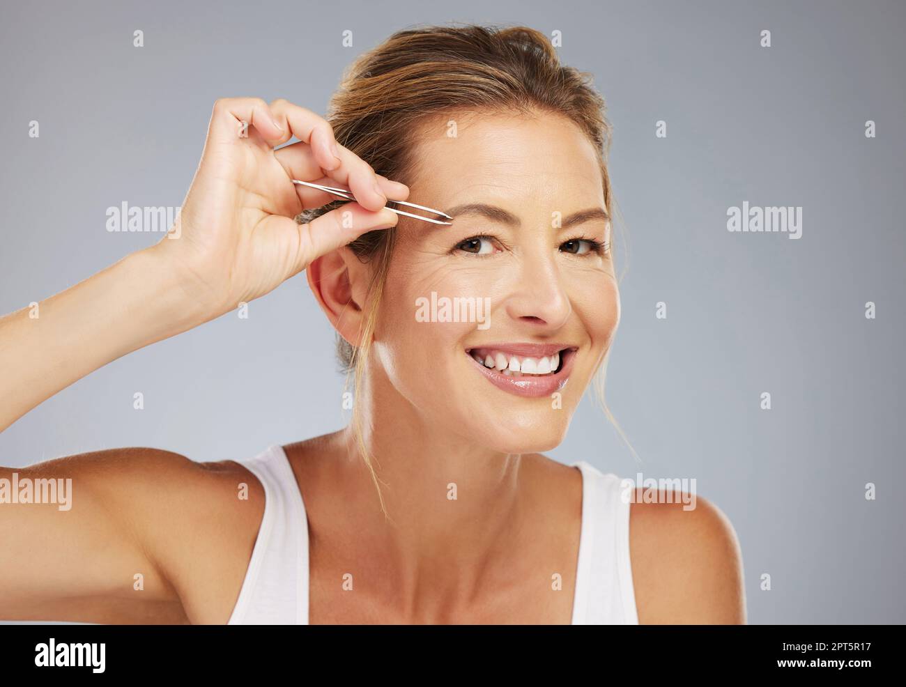 Face, eyebrows and senior woman plucking hair for beauty, wellness and