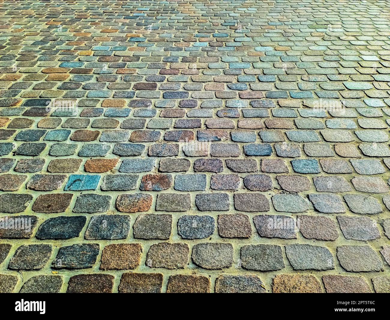 Detailed close up on old historical cobblestone roads and walkways all over europe Stock Photo