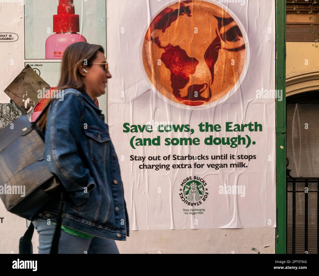 Wheatpasted poster from Peta advocating for Starbucks to stop surcharging for vegan “milk”, in Chelsea in New York on Monday, April 10, 2023. (© Richard B. Levine) Stock Photo