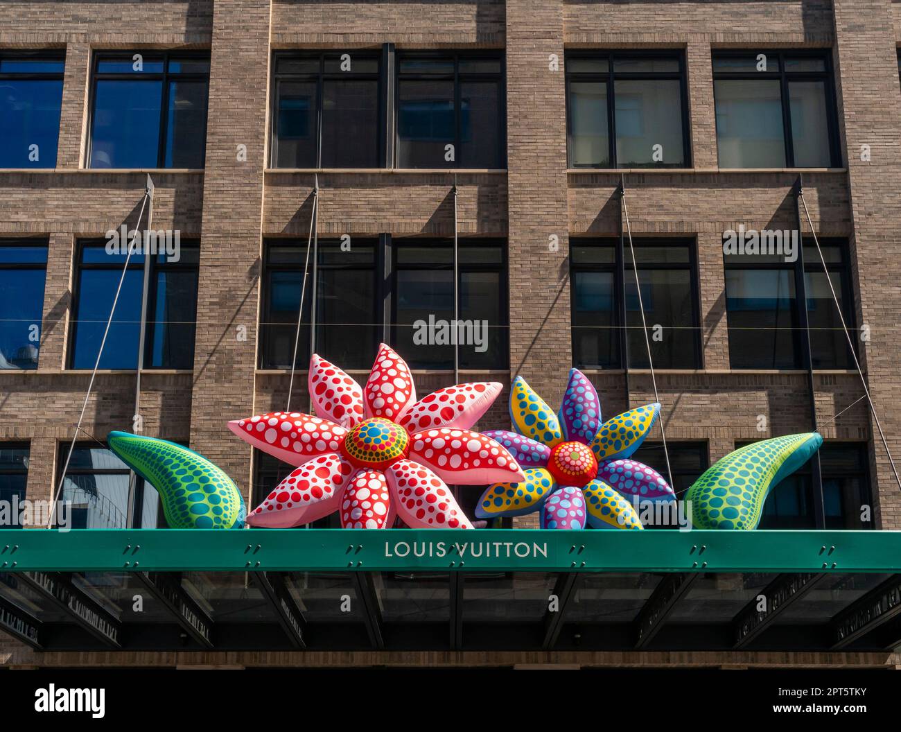 The Louis Vuitton store in the Meatpacking District in New York on  Saturday, April 8, 2023 with a display on the awning by Yayoi Kusama  announcing their collaboration with the brand. (©