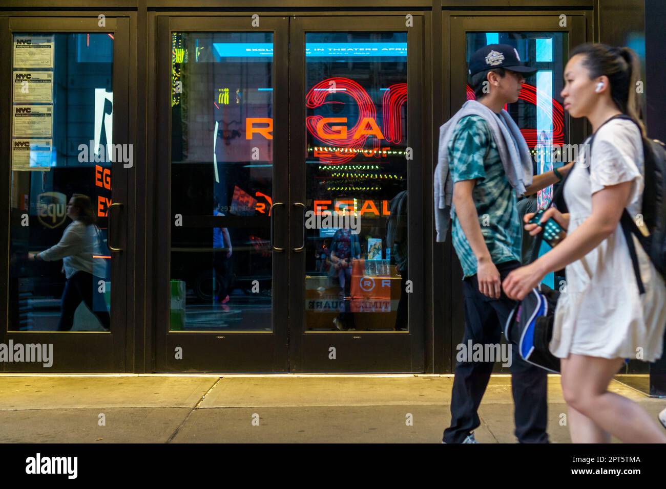 The Cineworld owned Regal Cinemas in Times Square in New York on Wednesday, April 12, 2023. The UK based Cineworld is reported to have filed a reorganization plan in a bankruptcy court in Texas. Cineworld is the second laragest operator of movie theaters in the world. (© Richard B. Levine) Stock Photo