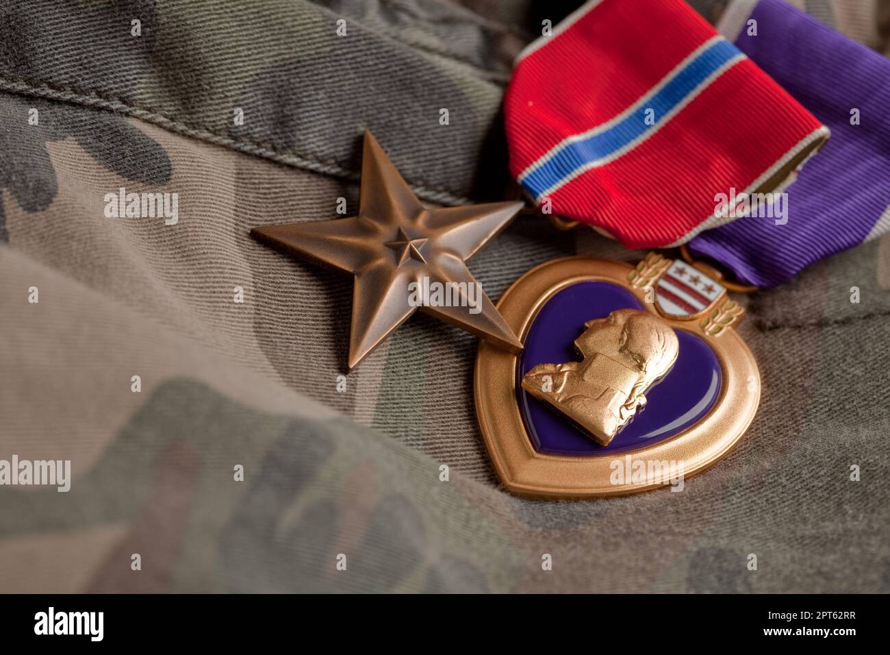 Bronze and Purple Heart Medals on Camouflage Material Stock Photo Alamy
