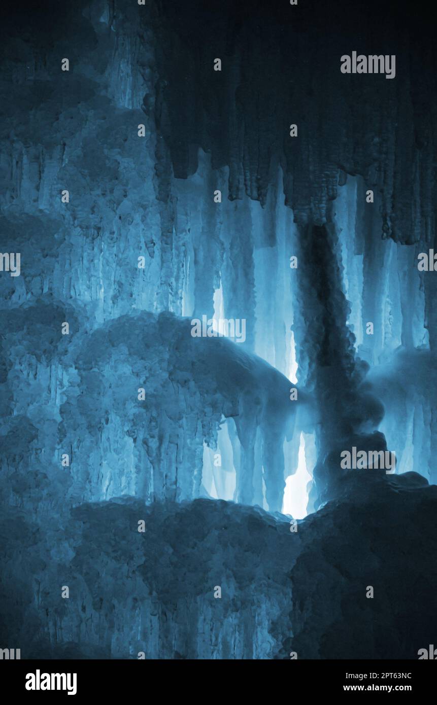 Huge ice icicles large blocks of ice frozen waterfall or water blue